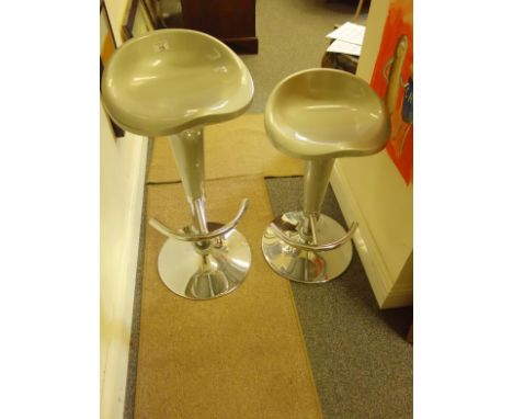 Pair of matching grey modern bar stools with moulded seats and chrome foot rests and base, a similar bar stool in black 