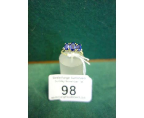 Ladies 3 stone Sapphire ring set on a 9ct gold shank with small diamond chip shoulders, size L, 2.7 grams,