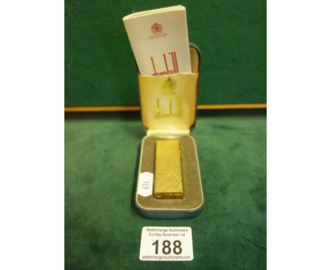 Alfred Dunhill, a gilt metal 1960 lighter with original box and instructions 