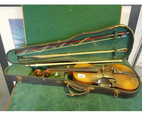 Cased Violin makers label inset, a copy of a stradivarius, 2 piece back with Violin bows, 