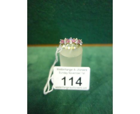 Ladies Pink Sapphire and Tanzanite ring size L, a cluster of stones on the half hoop design,
