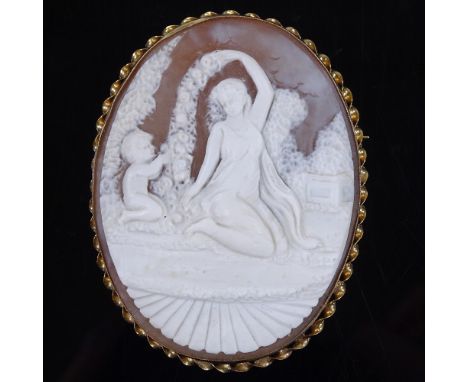 A relief carved cameo panel brooch, depicting Classical maiden and boy, in 9ct gold twist frame, panel length 59.2mm, 24.7g 