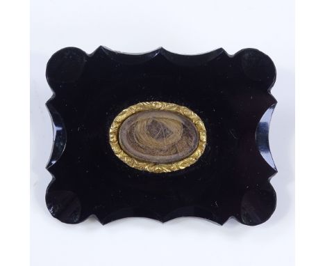 A Victorian jet panel mourning brooch, with central crystal covered hair panel, brooch length 44.6mm,  19g 