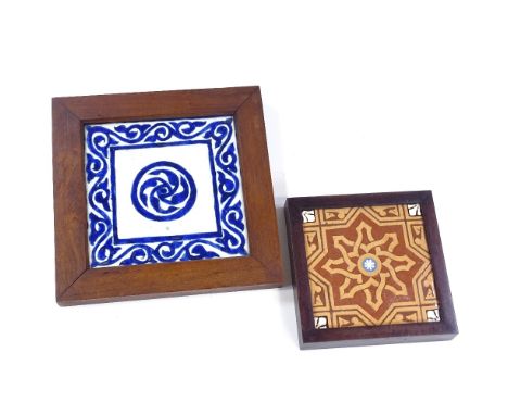 2 framed ceramic tiles, largest 27cm across including frame (2) 
