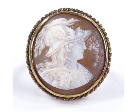 An unmarked gold large relief carved cameo panel ring, depicting Classical man with mask, within a rope twist surround, setti