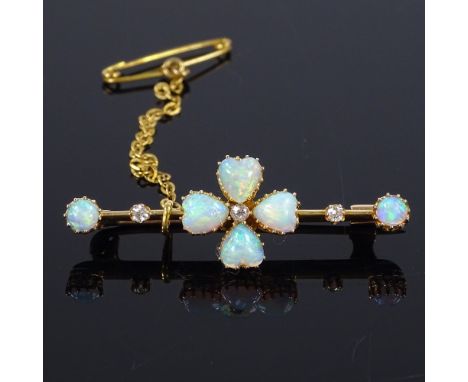 An Edwardian 15ct gold opal and diamond four-leaf clover bar brooch, set with heart and round cabochon opals, brooch length 4