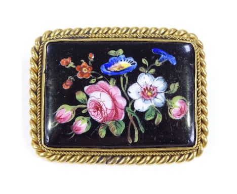 A rectangular floral painted porcelain panel brooch, in unmarked yellow metal rope twist frame, brooch length 50.4mm, 31.3g 