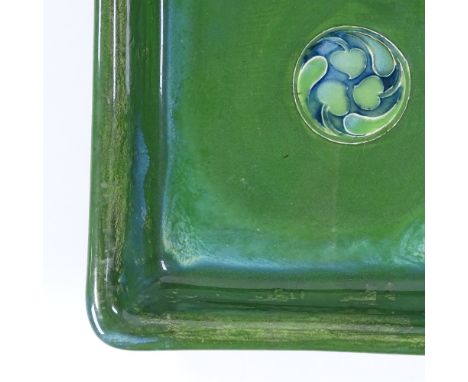 A Moorcroft Flamminian Ware square bowl, with green glaze and stylised central panel, 24cm across 