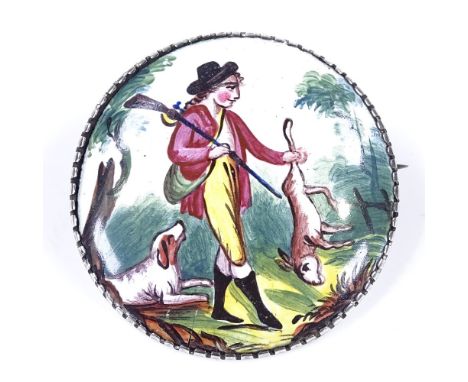 A late Georgian painted enamel hunting brooch, depicting game hunter with dog, unmarked silver frame, brooch diameter 38.6mm,