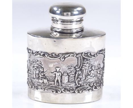 A late Victorian oval silver tea caddy, with relief embossed lover scenes, by Levi &amp; Salaman, hallmarks Birmingham 1900, 