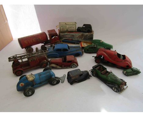 A collection of mixed tinplate and plastic clockwork vehicles for restoration including CKO (Kellerman) fire engine, Schuco A