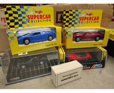 Five mixed boxed diecast vehicles including Maisto Super Car Collection etc