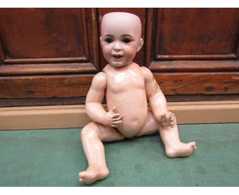An S.F.B.J, Paris 236 bisque head doll on jointed composition body, approx. 34 cm tall