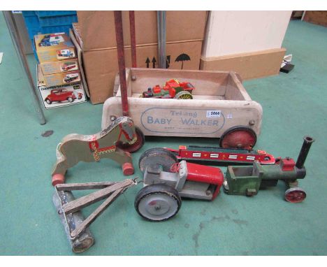 A Tri-Ang baby walker and other wooden toys including traction engine, barge, donkey etc