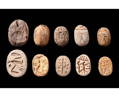 New Kingdom to Late Period, Ca. 1550 - 332 BC. A collection of five steatite scarabs, each carved with a domed back and detai
