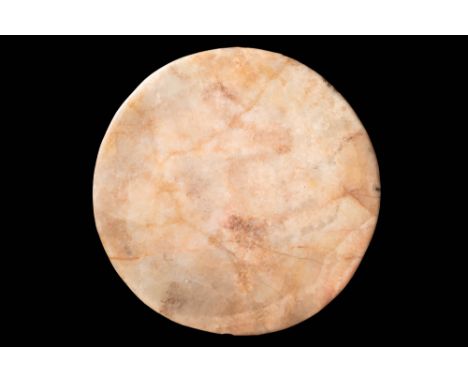 Old Kingdom, Ca. 2900 - 2200 BC. A large, shallow plate carved from alabaster with warm beige, honey, and soft orange veining