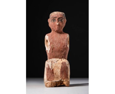 Middle Kingdom, Ca. 2055 - 1069 BC. A wooden figure of a seated male rower, depicted with legs bent beneath the body and arms