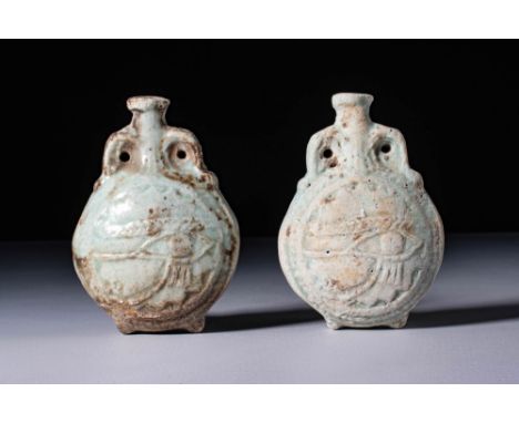 Ca. 30 BC - AD 200. A pair of turquoise-glazed faience flasks, each with a rounded and flattened body, and a short, cylindric