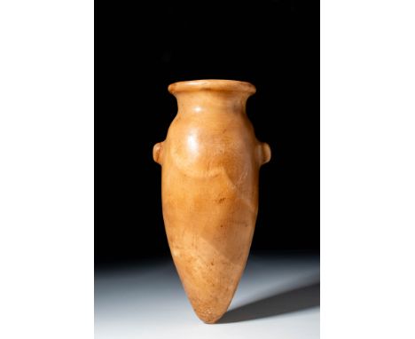 Old Kingdom, Ca. 2639 - 2347 BC. An alabastron carved from alabaster with an elongated, tapering body, rounded shoulders, and