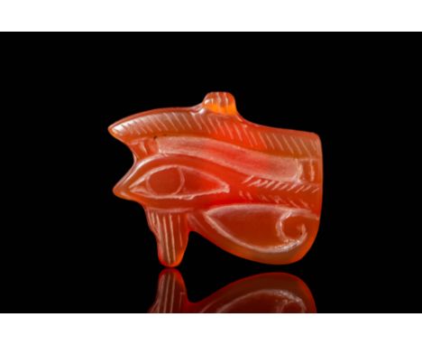 New Kingdom, Ca. 1550 - 1069 BC. A carnelian Wedjat eye amulet, carved in the form of the Eye of Horus with well-defined deta