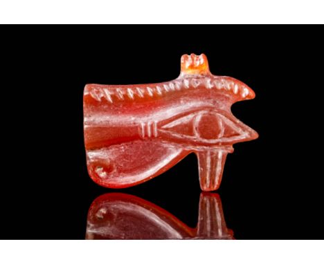 New Kingdom, Ca. 1550 - 1069 BC. A carnelian Wedjat eye amulet, carved in the form of the Eye of Horus with well-defined deta