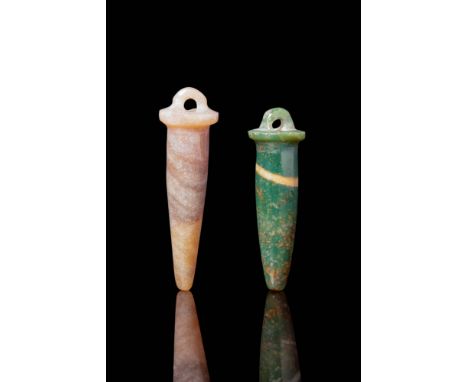 Late Period, Ca. 664 - 30 BC. A pair of stone wadj amulets, each carved in an elongated form with a flaring top and a central