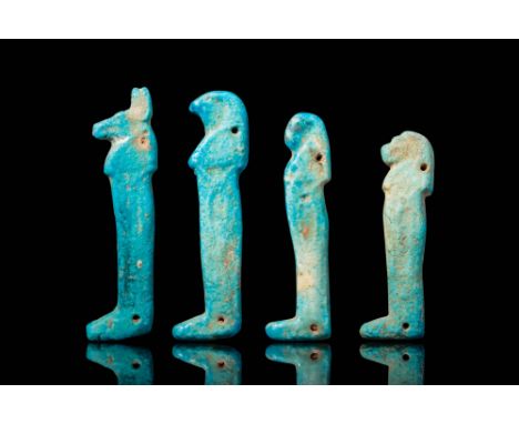 Third Intermediate Period to Late Period, Ca. 1069 - 332 BC. A collection of four faience amulets representing the Four Sons 