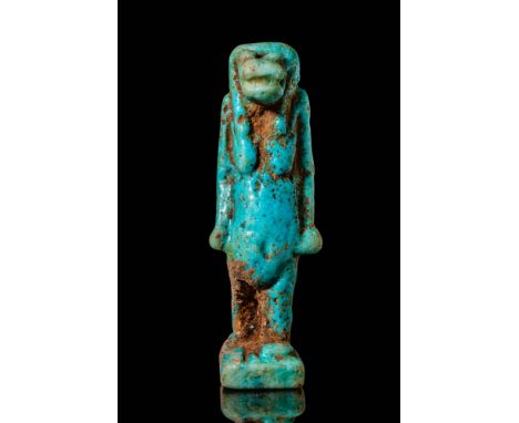 Third Intermediate Period to Late Period, Ca. 1069 - 332 BC. A faience amulet depicting Taweret standing on a rectangular bas
