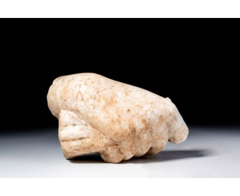 Ca. AD 200. A fragmentary marble right hand. The fingers curved around a smooth, rounded object held firmly in the palm. The 