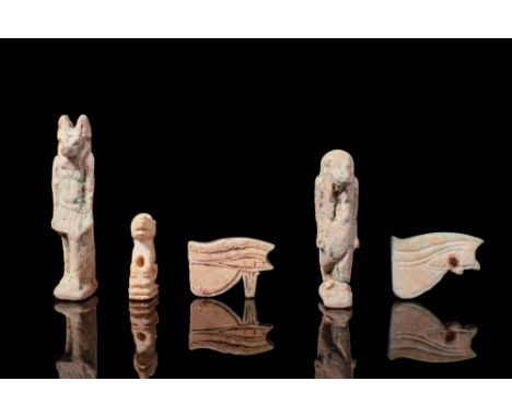 Third Intermediate Period to Late Period, Ca. 1069 - 332 BC. A collection of five faience amulets. The piece on the left repr