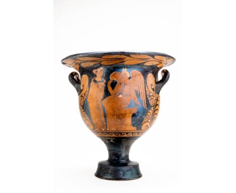 Ca. 350 - 325 BC.A red-figure bell krater with a wide flaring rim, twin upturned handles, and a deep body set on a high foot.