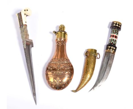 An Indian Pesh-Kabz, with 18cm straight T section steel blade, white metal hilt with foliate engraved and enamelled decoratio