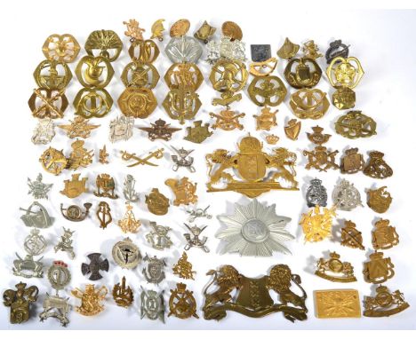 A Collection of  Approx. 55 Belgian Cap Badges and Helmet Plates, mainly brass and plated examples, including Carabinier Cycl
