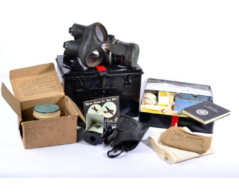 Second World War Home Front Interest:- an ARP black japanned First Aid tin and contents, and a larger tin containing two gas 