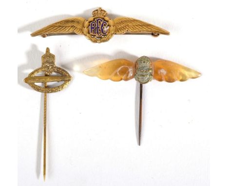 A Royal Flying Corps 10 Karat Gold Sweetheart Brooch by Ryrie Bros., as a pair of wings flanking the pierced and blue enamell