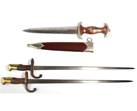 A German Third Reich SA dagger, the steel blade etched, ''Alles fur Deutschland'', the ricasso with maker's mark for Carl Eic