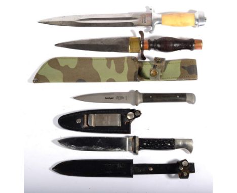 A German H J Type Knife, the 14cm single edge steel blade by Hubertus, Solingen, with antler grip scales and plated bird head