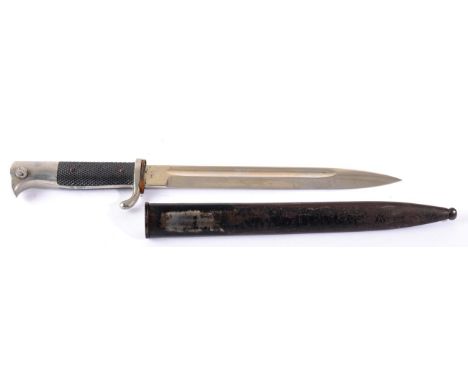 A Second World War German Artillery Parade Bayonet, the blade with WKC maker's mark, the plated white metal hilt with chequer