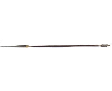 An 18th Century Indo-Persian Steel Lance, the 30cm spearpoint blade and spatula type butt with traces of foliate koftgari dec