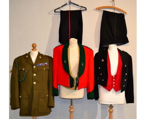 A Uniform to a Captain of the Green Howards, comprising a No.2 Service dress tunic with staybrite buttons and collar badges, 