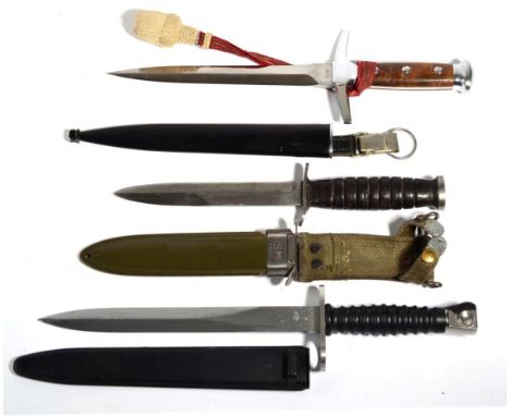 A Swiss M1943 Army Dagger, the double edge steel blade stamped Elsener Schwyz and numbered 31910 at the ricasso, the hilt wit