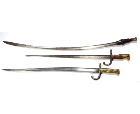 A Model 1866 Chassepot Yataghan Bayonet, the ricasso stamped with A C scales logo; a French Model 1874 Gras Bayonet, with St 