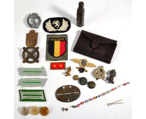 A Quantity of Mainly German Militaria, including a 1957 West German Veteran's Squadron Clasp and hanger, a similar Lappland S