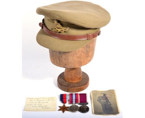 Second World War British Prisoner of War Interest - a Trio, comprising 1939-45 Star, War Medal and Long Service and Good Cond