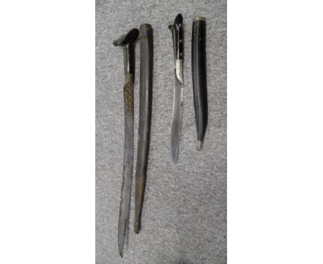 A TURKISH SHORTSWORD (YATAGHAN) AND A BALKAN DAGGER (BICHAQ), 19TH CENTURY the first with curved single-edged blade (chipped)