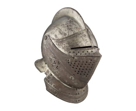 THE PROPERTY OF A EUROPEAN NOBLEMAN A SOUTH GERMAN CLOSE HELMET WITH EMBOSSED DECORATION IN THE 'BLACK AND WHITE' FASHION, CI