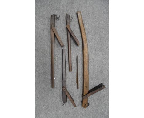 FOUR 'GOAT'S FOOT' SPANNING DEVICES FOR CROSSBOWS, FIRST HALF OF THE 18TH CENTURY, PROBABLY GERMAN AND A CROSSBOW BOLT the fi