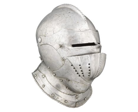 A COMPOSITE SOUTH GERMAN CLOSE HELMET, CIRCA 1530-40 with rounded one-piece skull (originally forming part of a burgonet) ris