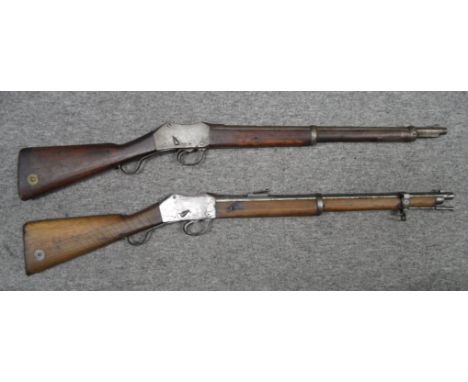 TWO .577/450 MARTINI HENRY RIFLES, THE FIRST DATED 1887 of regulation type, the first with sighted barrel retained by two ban