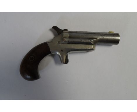 A COLT .41 CALIBRE THIRD MODEL RIM-FIRE DERINGER, NO. 46836, CIRCA 1890 of standard production specifications, with 2 1/2 in 